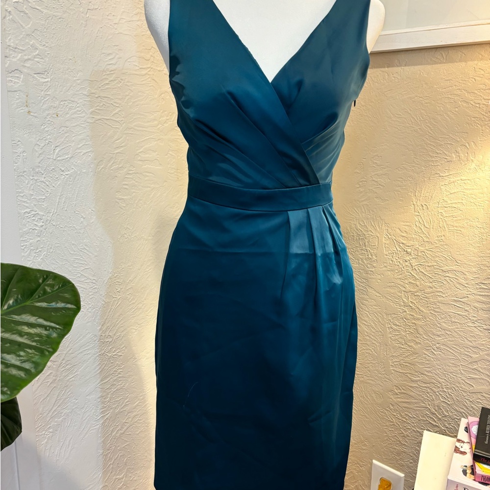 Well constructed teal dress by The Limited.